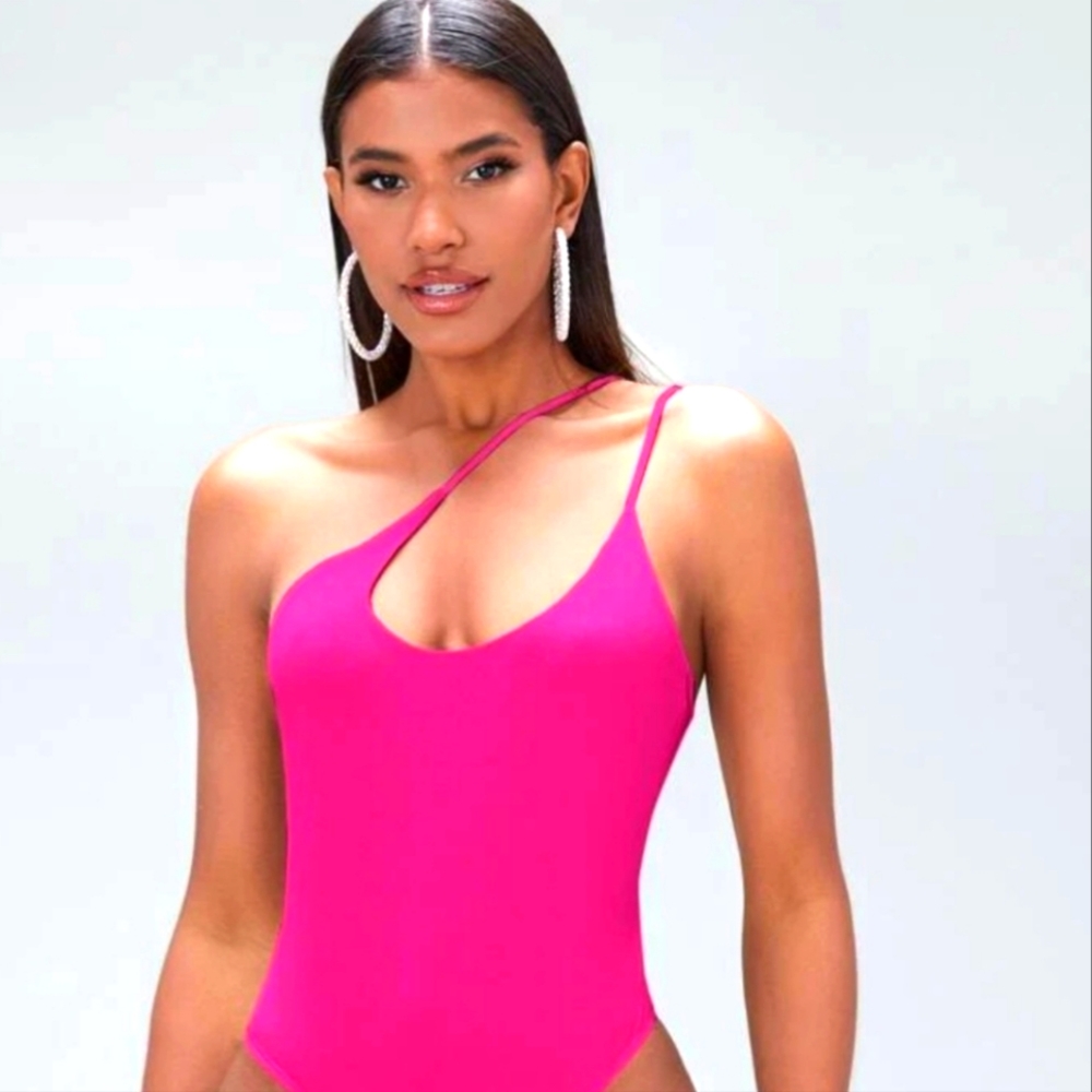 Women's brand new pink bodysuit size small.